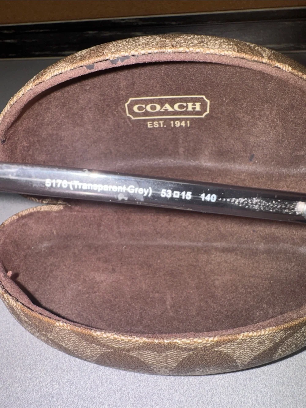 Coach branded signature